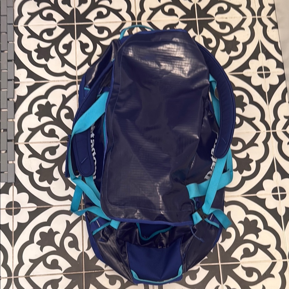 Blue 55L Patagonia Black Hole duffel with backpack straps